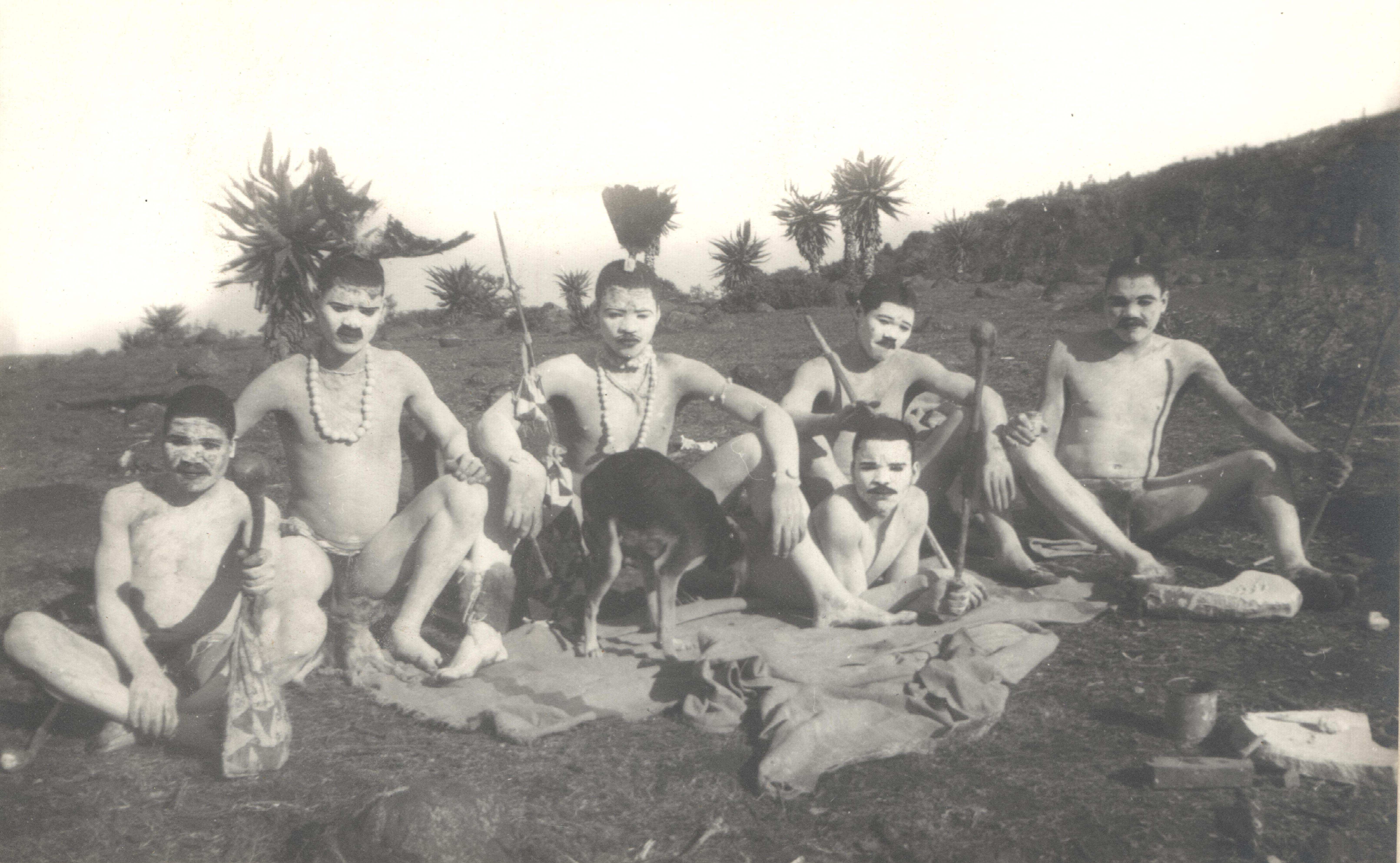 PHOTO-FBM Xhosa Initiation Series - the umqwetu with hunting dog , knob kieries and spears PHOTO-FBM Xhosa Initiation Series - the umqwetu with hunting dog , knob kieries and spears